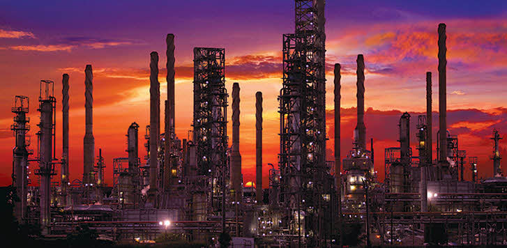 Refinery with sunset in background